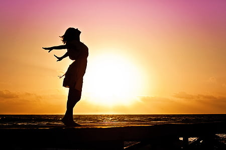 woman-happiness-sunrise-silhouette-thumb.jpg