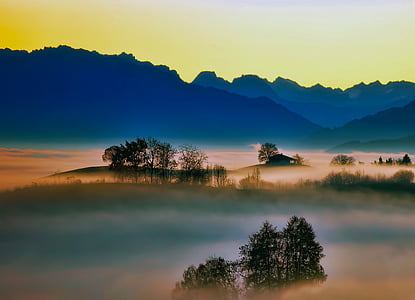sunrise-fog-silhouettes-mountains-thumb.jpg